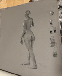 a drawing of a woman sitting on a table